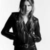 Model in B&W photograph, wearing an edgy AllSaints Leather Jacket