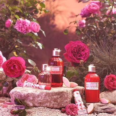 L'Occitane bottles surrounded by pink roses