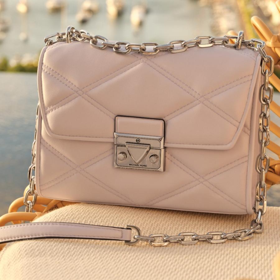 Small white Michael Kors handbag with chain handle